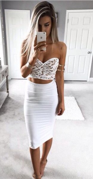 White crop top with sweetheart neckline and high waisted fitted
midi skirt