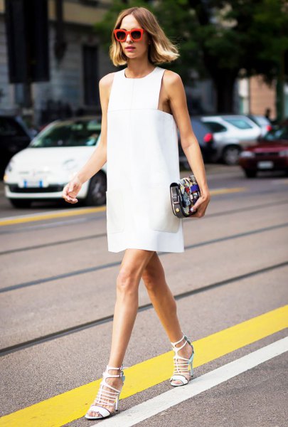 White tank sheath mini dress with lace up heeled sandals