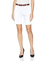 White tank top with knee length belted chino shorts