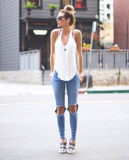 White tank top with light blue skinny jeans and checked sneakers