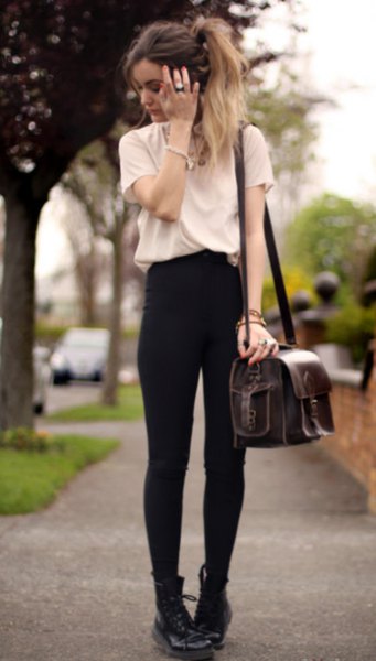 White t-shirt with black skinny jeans and combat boots