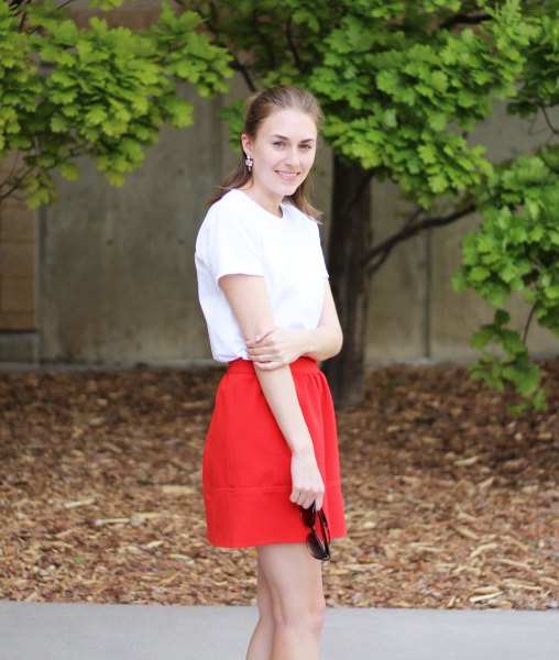 white t-shirt with red mini cotton skirt