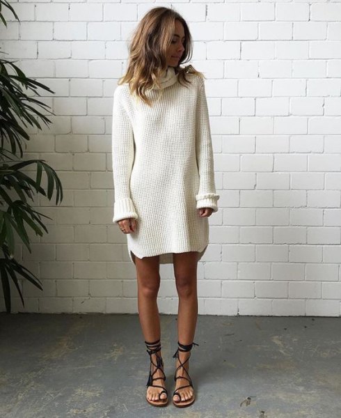 White turtleneck sweater dress with gladiator sandals