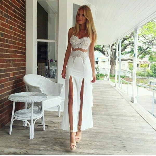 White two piece prom dress with double slit and pink heels