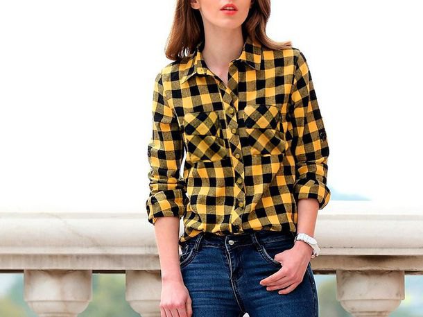 Yellow and black checked shirt and dark blue skinny jeans