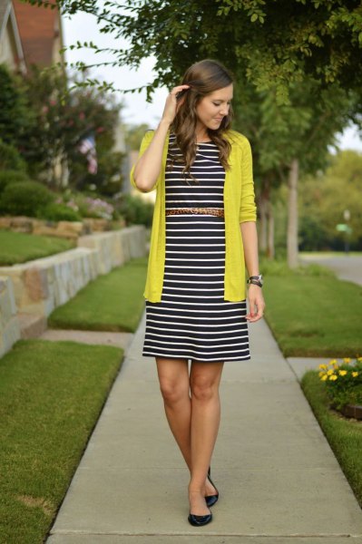 yellow cardigan with black and white striped midi dress