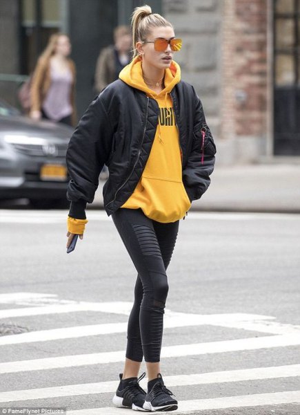 Yellow hoodie with black bomber jacket and short leggings