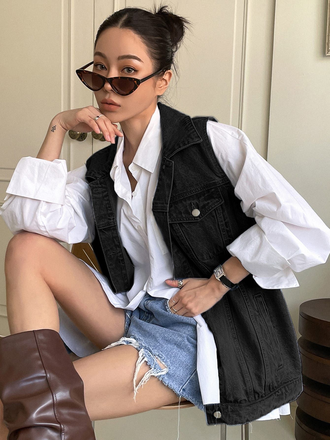 The Versatility of a Black Denim Vest:
How to Style for Any Occasion