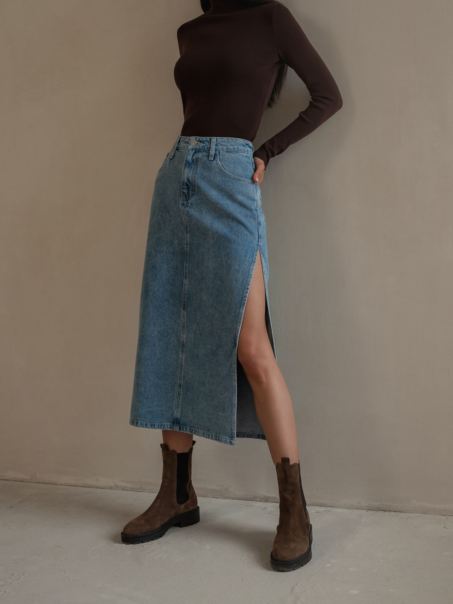 Add denim midi skirts to your fashions to look more elegant