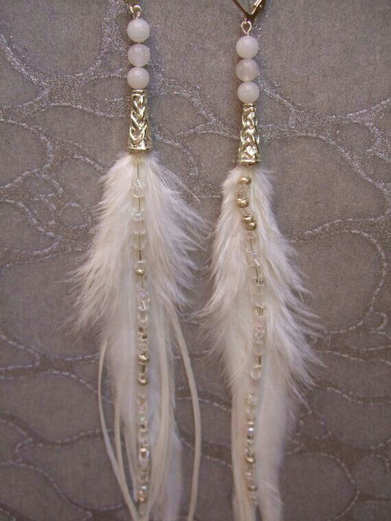 Feather earrings the new found love!!