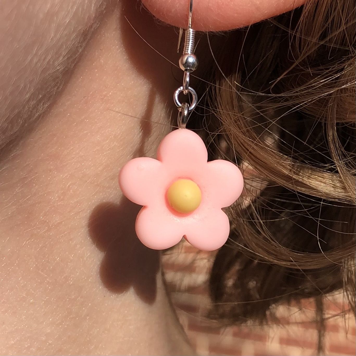 Flower earrings sparkle like your eyes in the sun