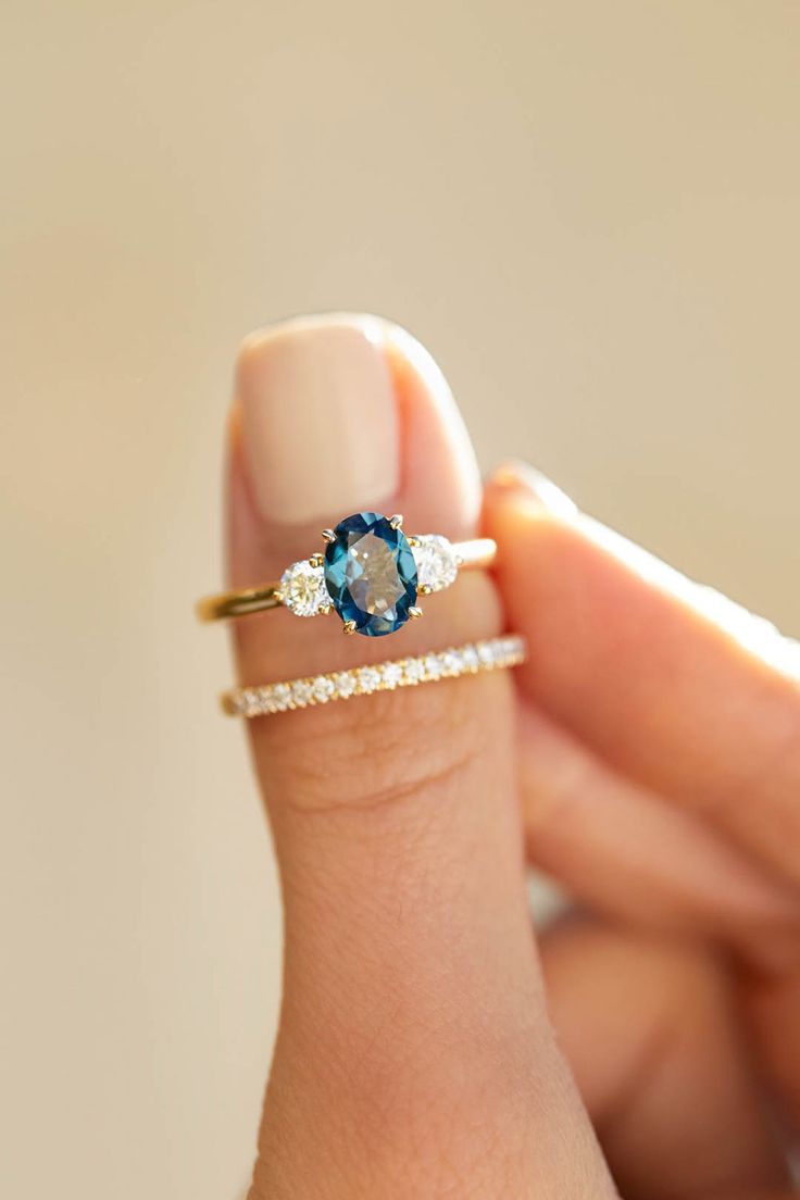 Slip the perfect gemstone engagement rings on her finger!!