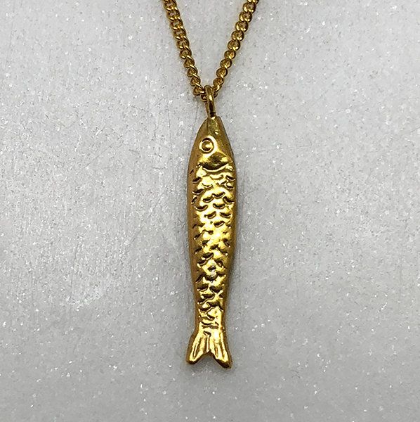 Add elegant gold pendant to your style