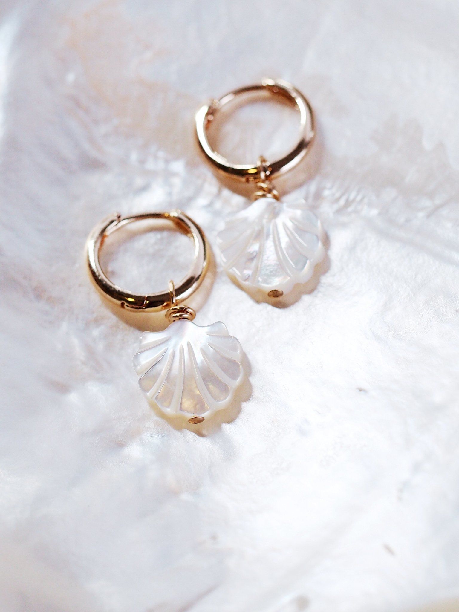 Pick stylish pieces in mother of pearl earring for attractive looks