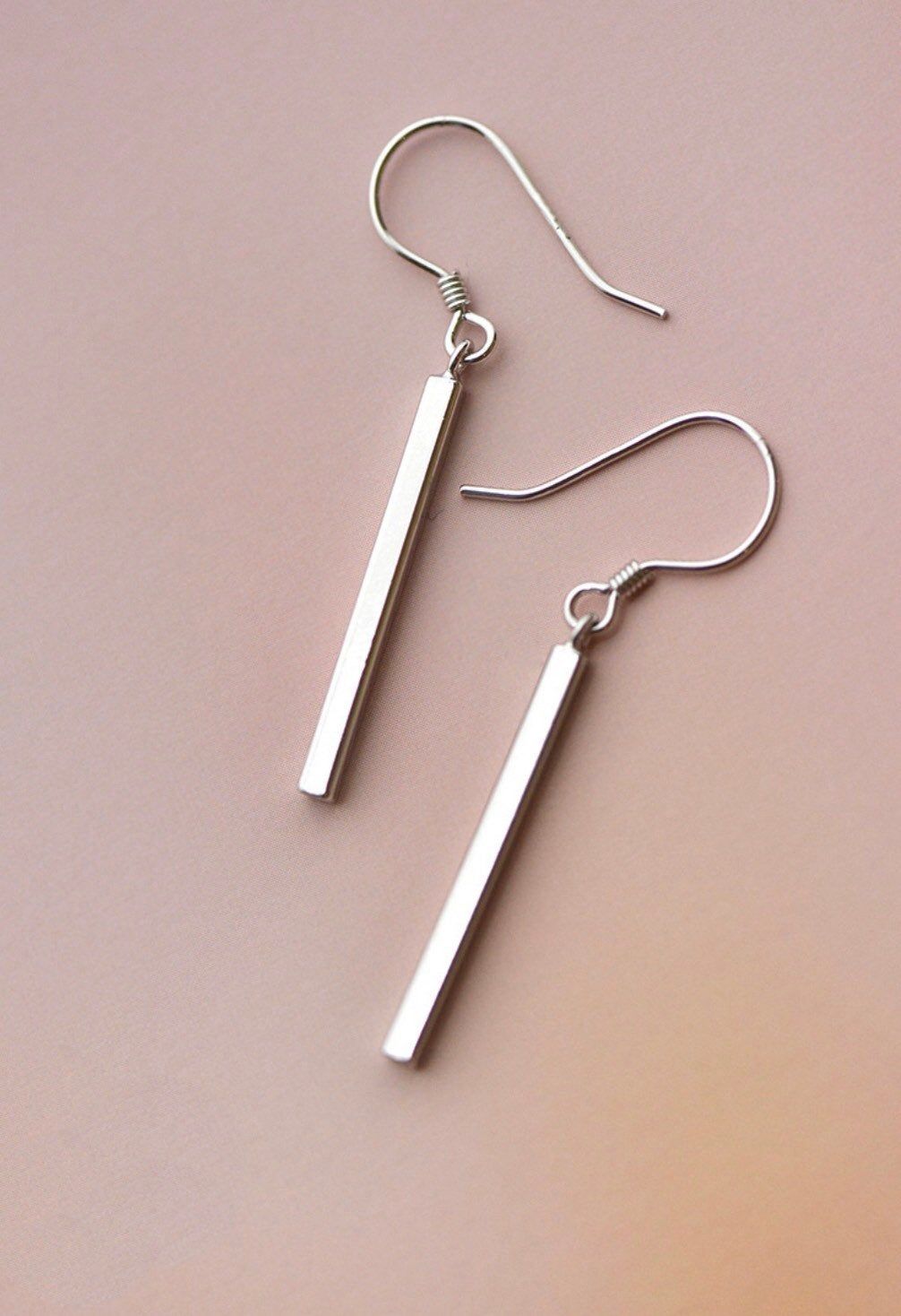 The silver dangle earrings to wear at various occasions
