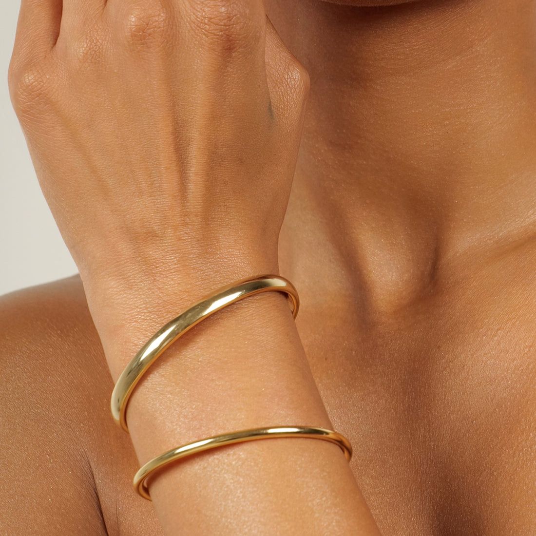 Enhance your personality by wearing gold bangles