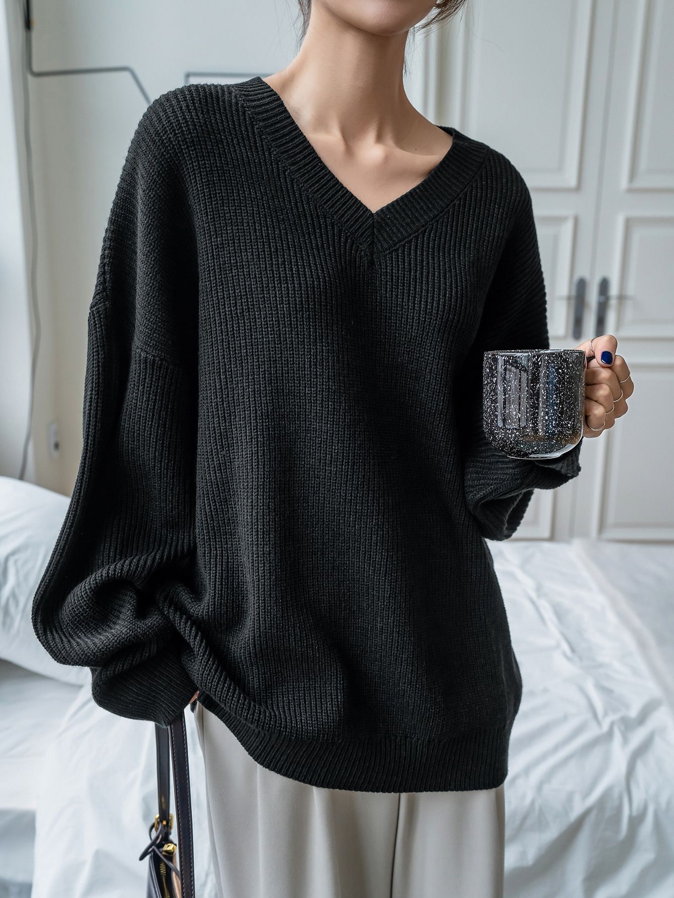 Essential Wardrobe Piece: The Black
V-Neck Sweater