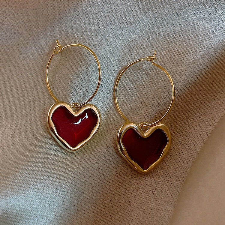 The Trendiest Gold Heart Earrings Every
Woman Needs in Her Collection