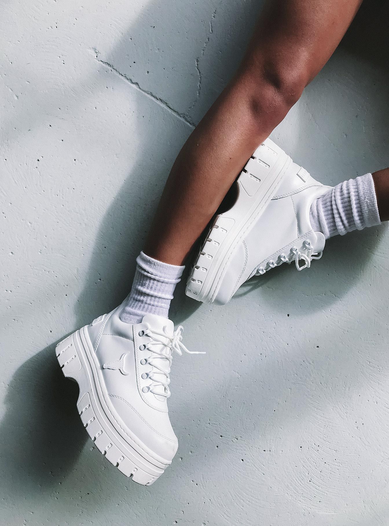 The Rise of White Platform Sneakers: A
Fashion Staple