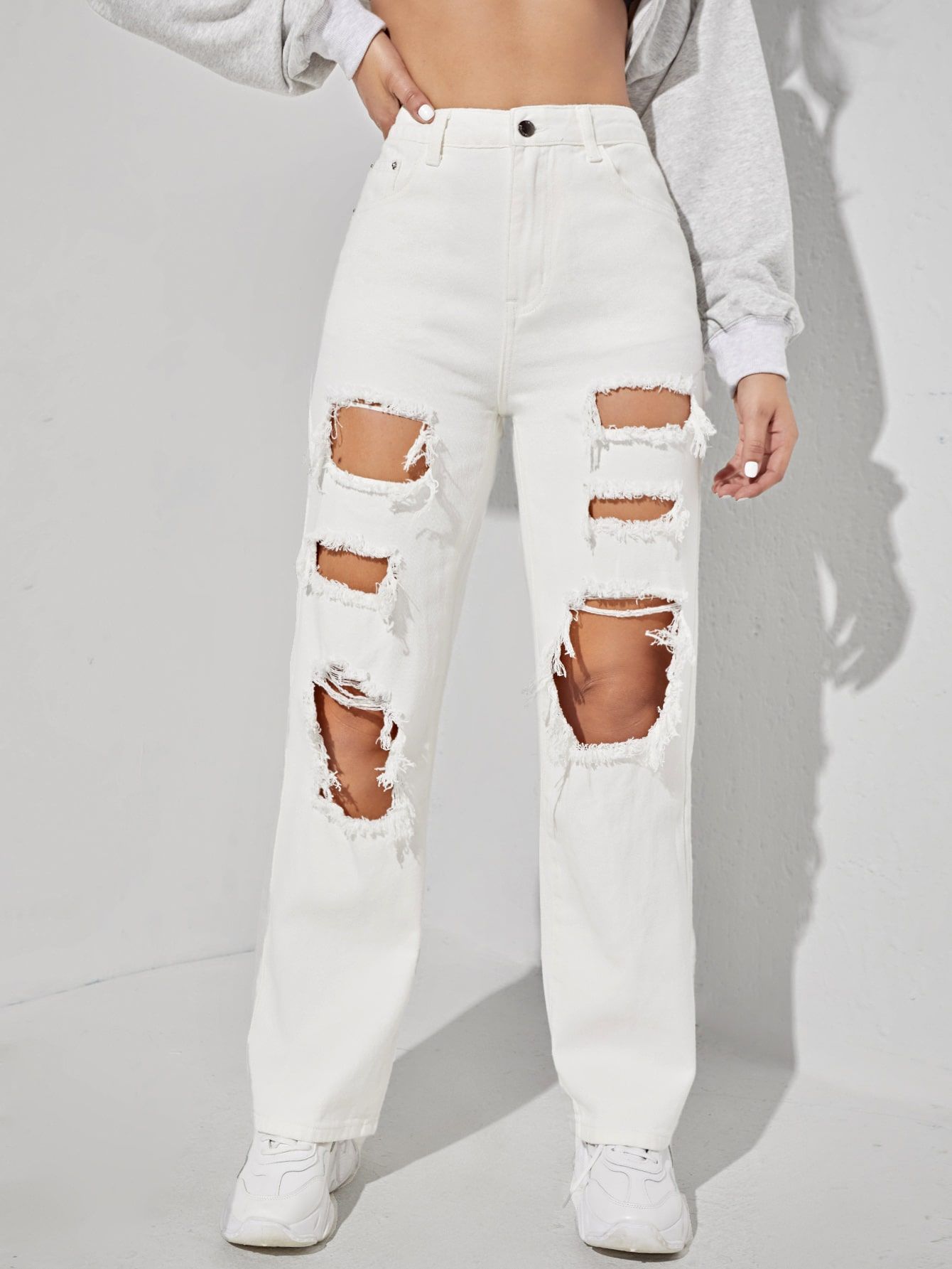 Why Every Fashionista Needs a Pair of
White Ripped Jeans