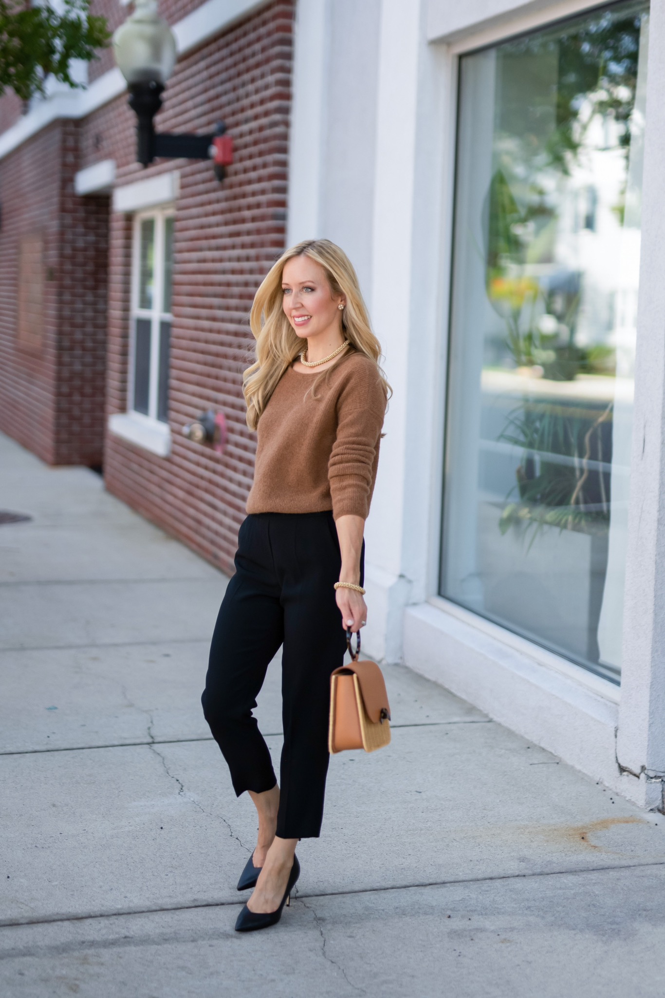 Neutral sweater with <a href=