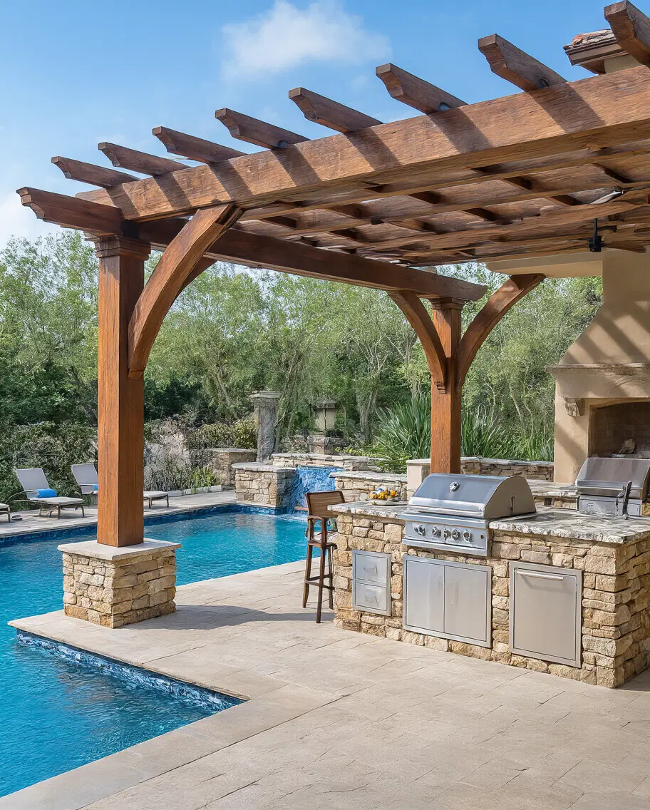shaded poolside outdoor kitchen oasis