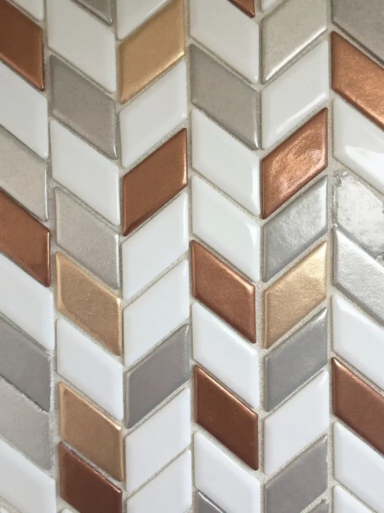innovative metal and porcelain kitchen backsplash