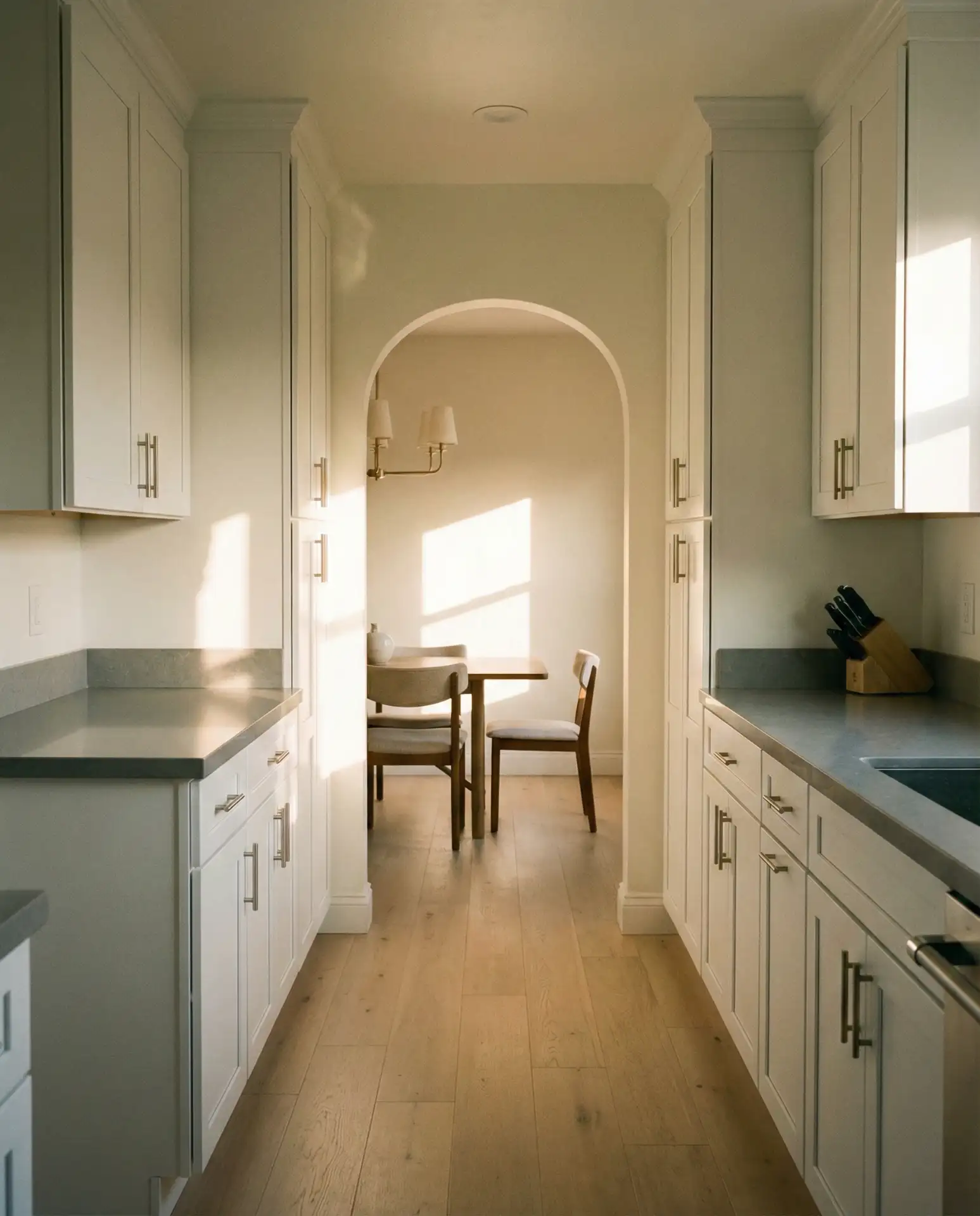 Open-End Galley Plans with White Cabinetry