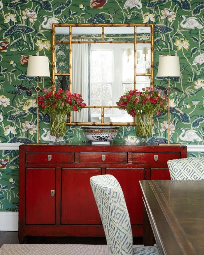 vibrant red sideboard with flowers