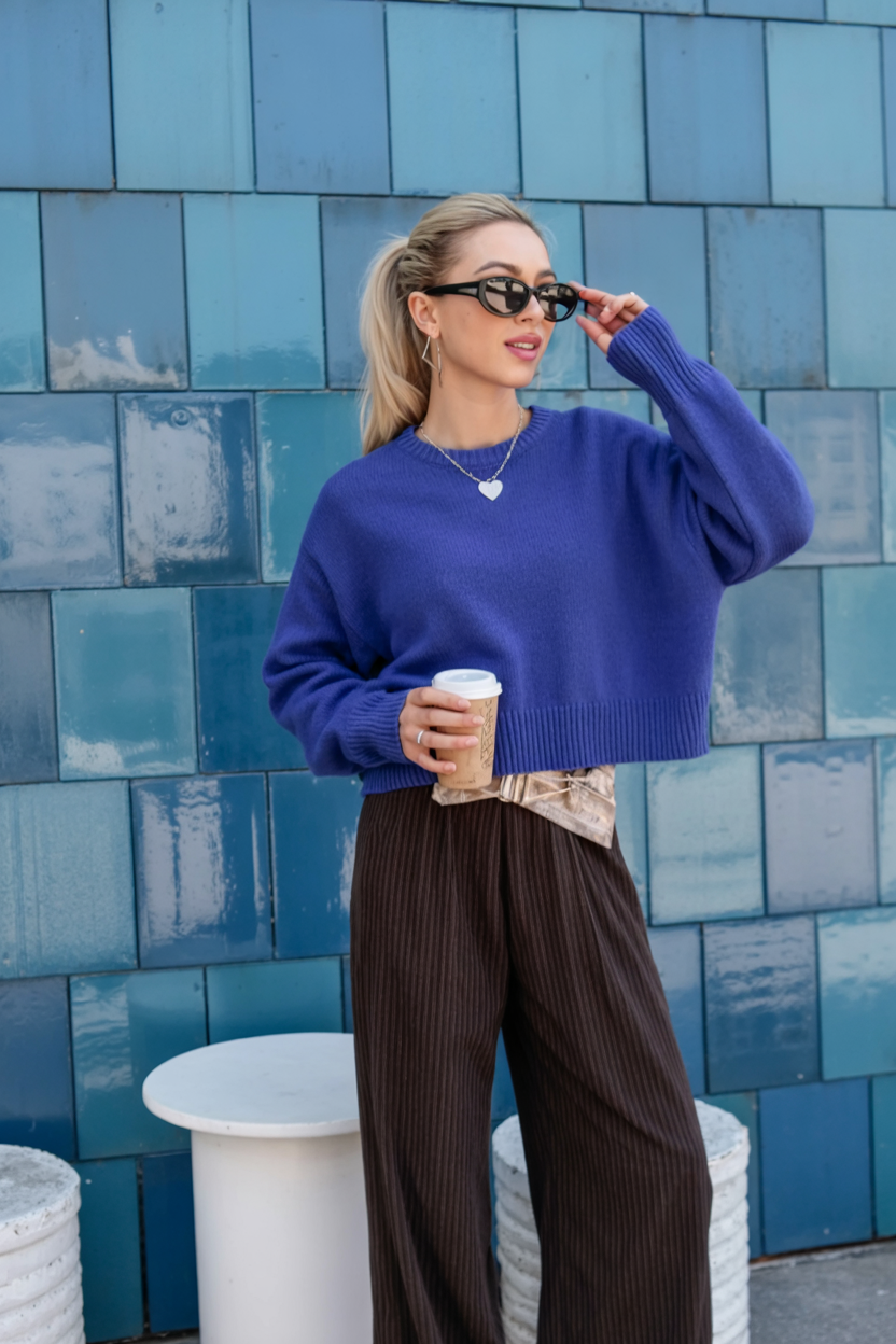 electric blue cropped sweater with wide lap trousers
