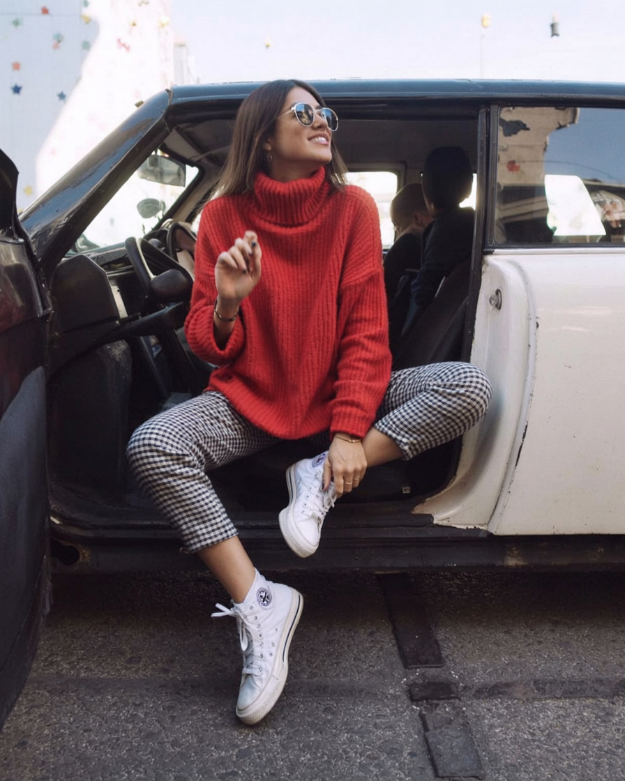 red turtleneck with gingham trousers