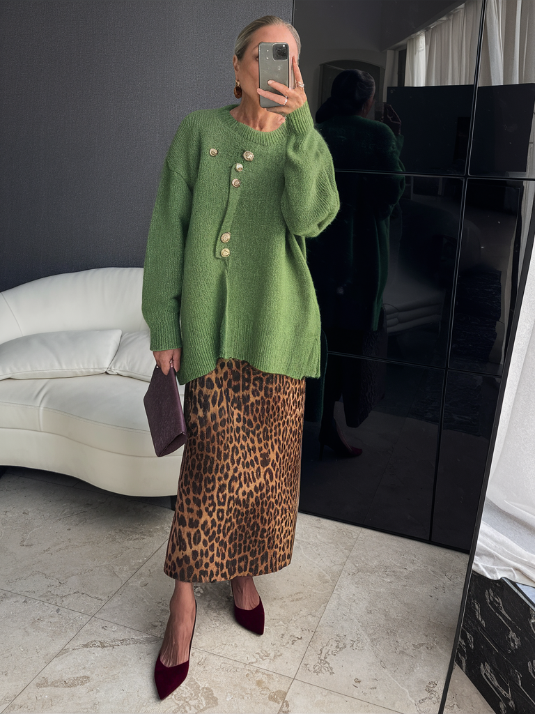 Green oversized sweater with leopard print skirt