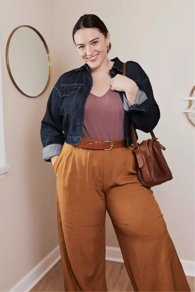 Rust trousers with mauve bodysuit and denim jacket