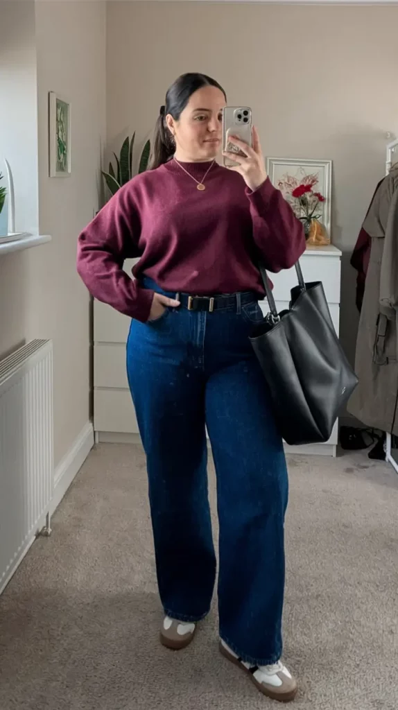Burgundy sweater with dark high-rise denim