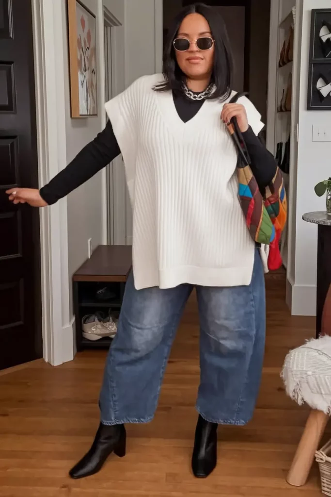Layered white vest and denim with boots