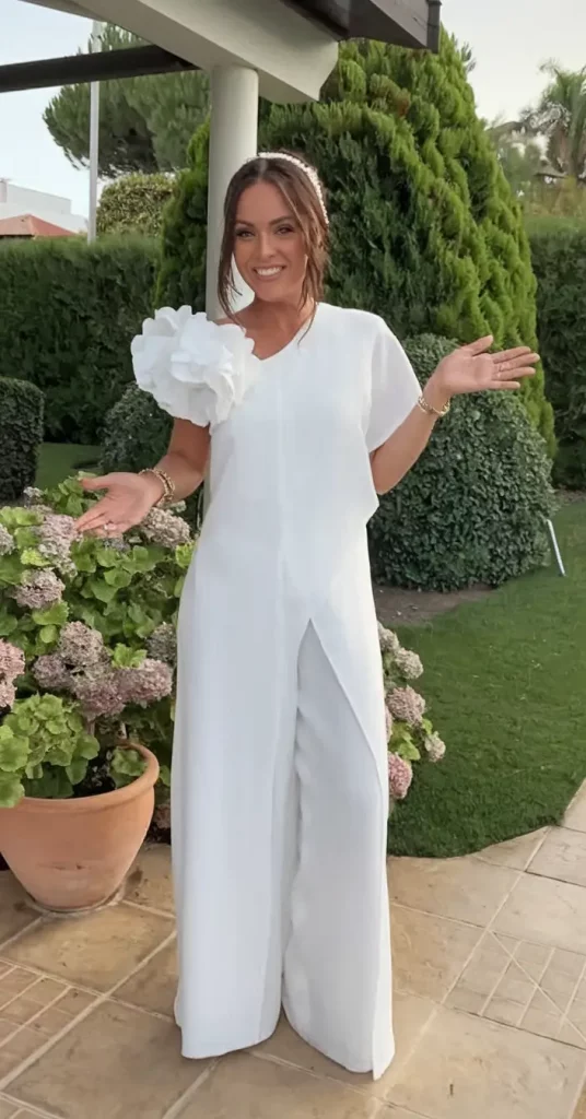 White tailored fall outfit with floral embellishment