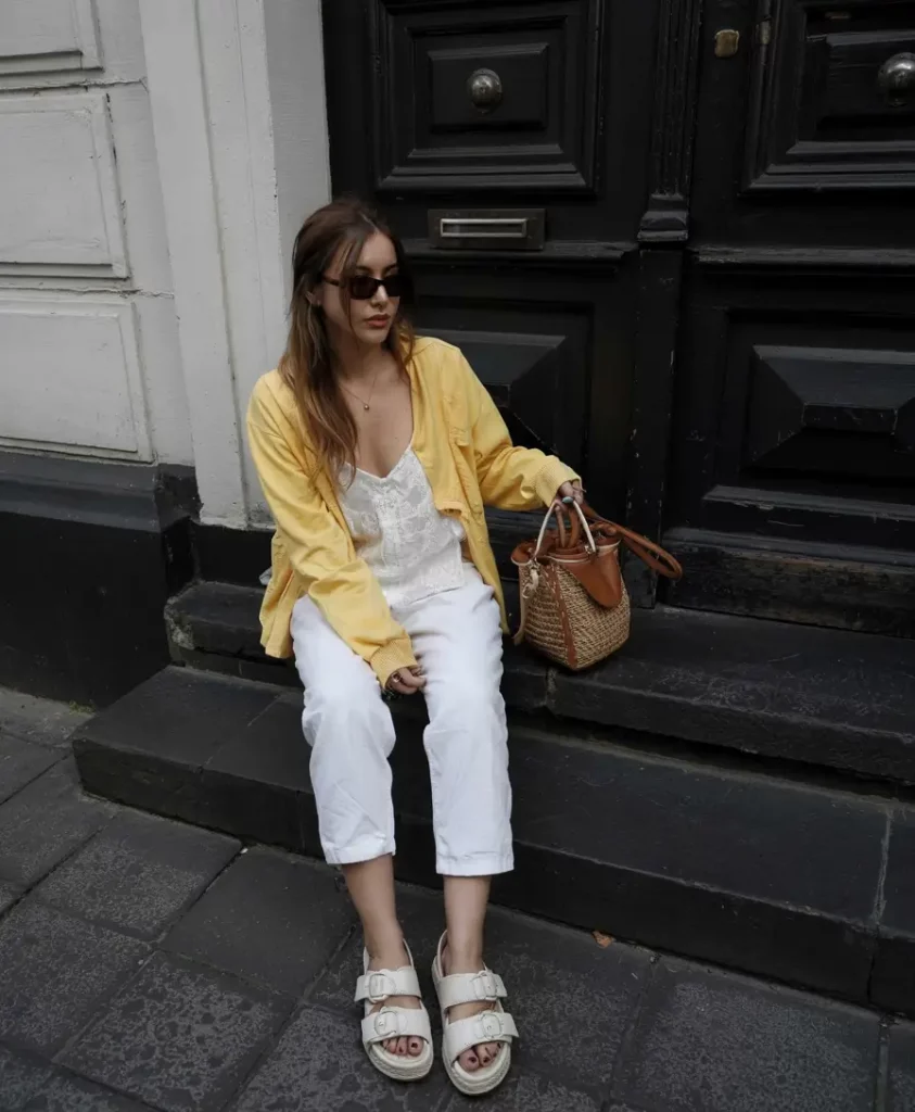 Soft yellow layers with sandals