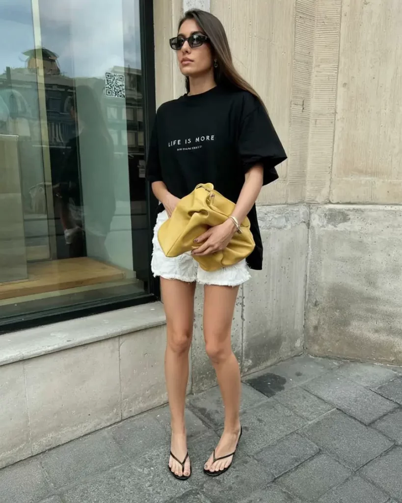 Graphic tee with sandals and shorts